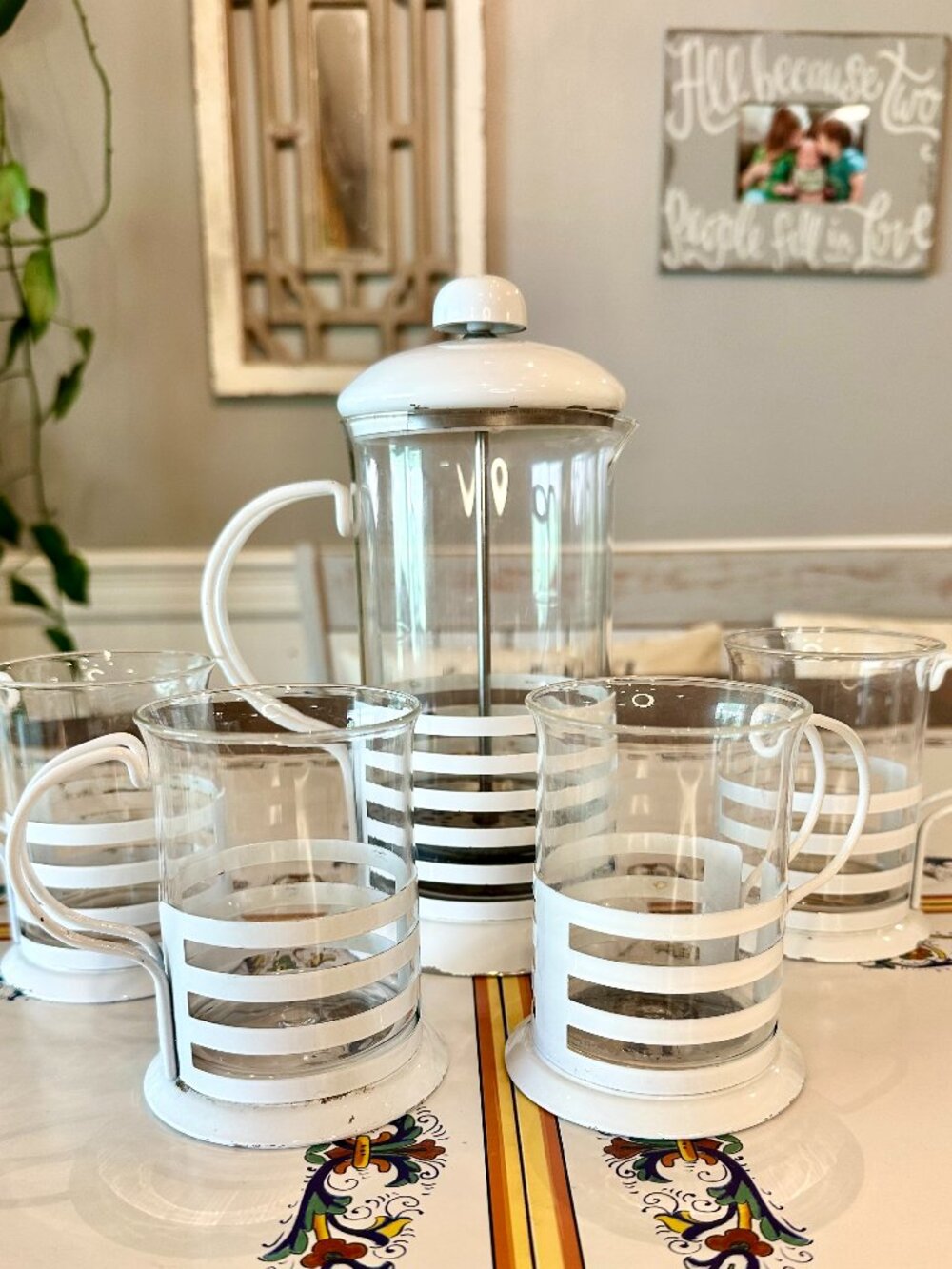 vintage French press coffee maker with four cups